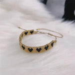 Bracelet miyuki doré et noir